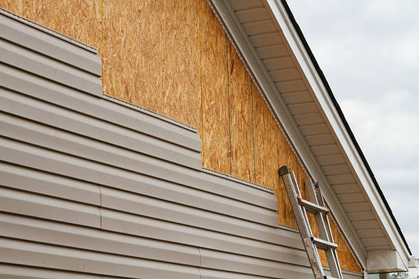 Professional Storm Damage Siding Repair technician working in Berkeley, IL